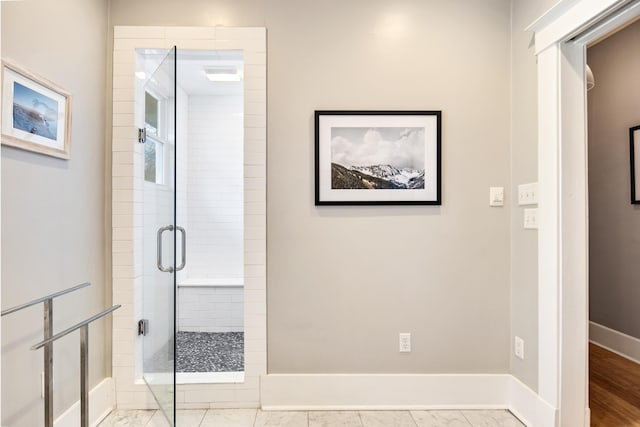 bathroom with an enclosed shower