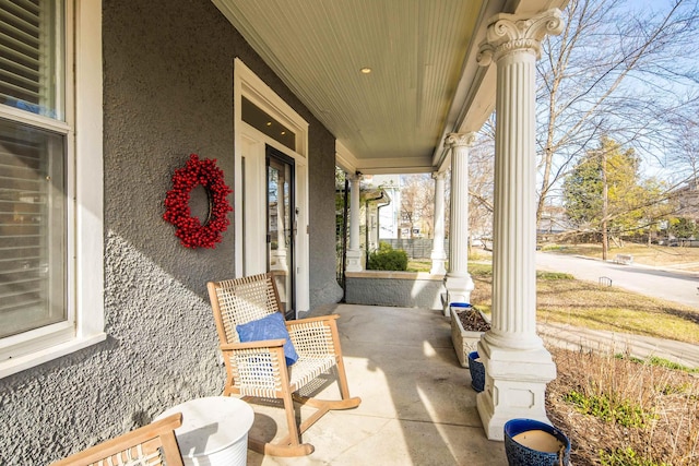 view of patio featuring a porch