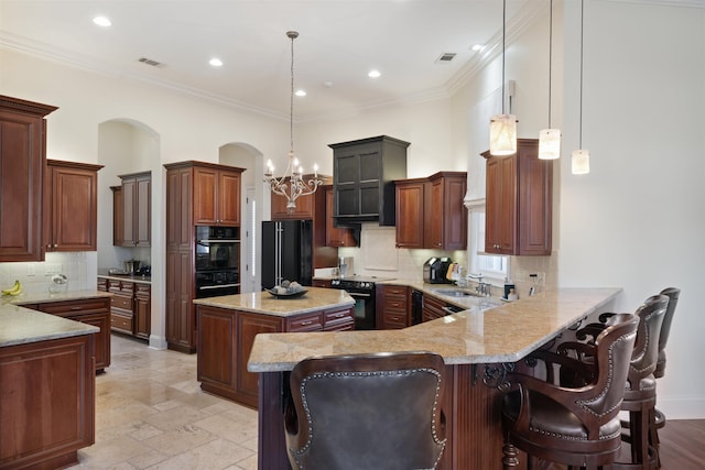 kitchen with backsplash, a kitchen island, black appliances, kitchen peninsula, and a kitchen bar