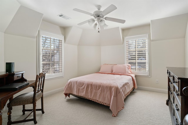 bedroom with ceiling fan and light colored carpet