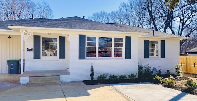 view of side of home with a patio area