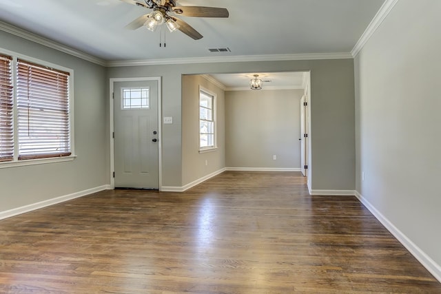 entryway with ceiling fan, ornamental molding, and dark hardwood / wood-style floors