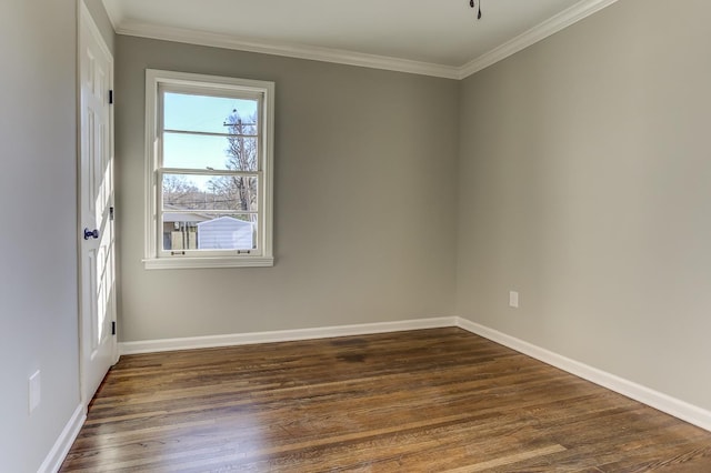 unfurnished room with dark hardwood / wood-style flooring and ornamental molding