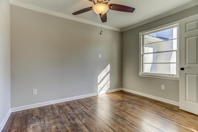 spare room featuring ornamental molding, dark hardwood / wood-style floors, and ceiling fan