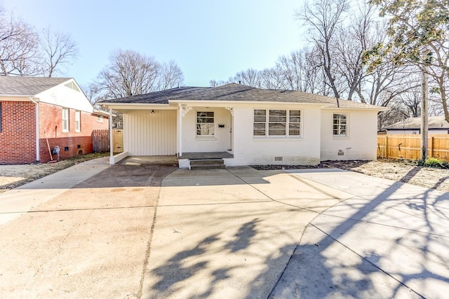 view of front of home featuring a carport