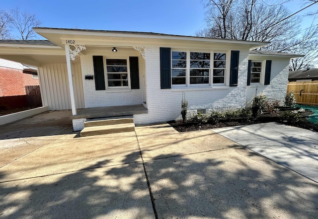 view of front of house featuring a carport