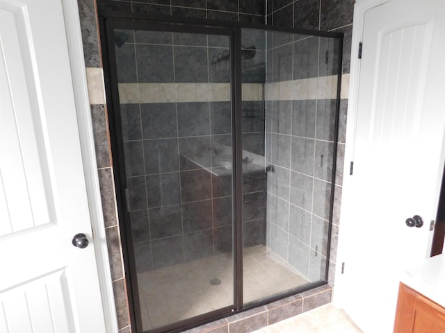 bathroom featuring a stall shower