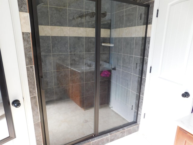 bathroom with a shower stall