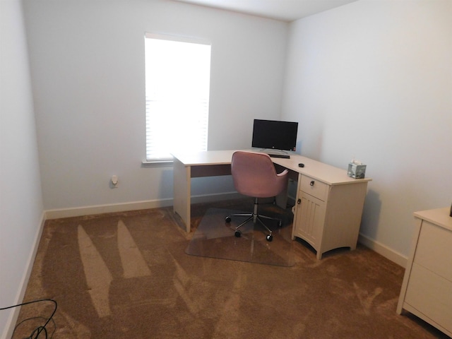 home office with baseboards and carpet flooring