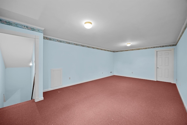 basement featuring ornamental molding and carpet flooring