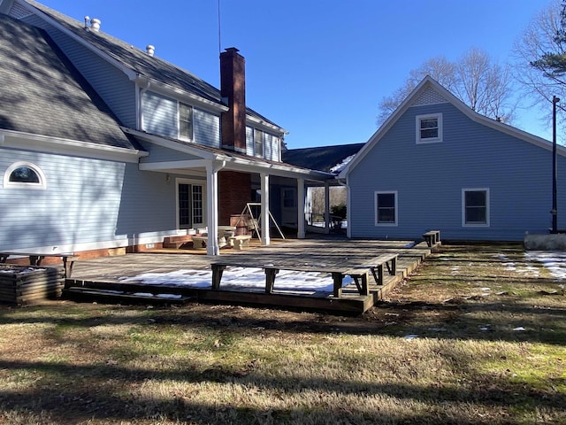 rear view of house with a deck