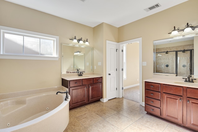 bathroom featuring tile patterned floors, separate shower and tub, and vanity