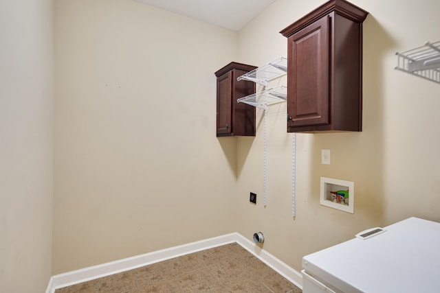 laundry room featuring cabinets, hookup for a washing machine, and hookup for an electric dryer