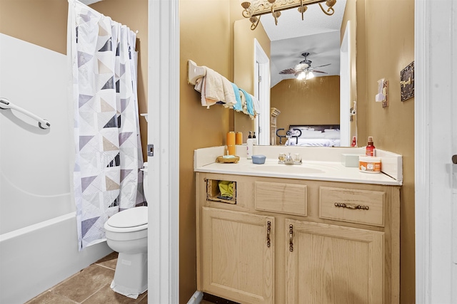 full bathroom with tile patterned floors, vanity, shower / bath combination with curtain, toilet, and ceiling fan