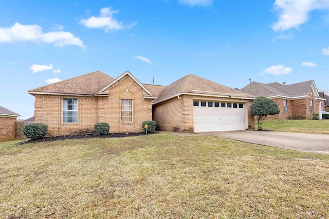 ranch-style home with a front lawn and a garage