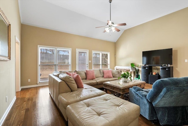 living room featuring lofted ceiling, ceiling fan, and dark wood-type flooring