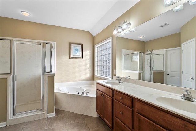 bathroom featuring tile patterned floors, vanity, lofted ceiling, and shower with separate bathtub