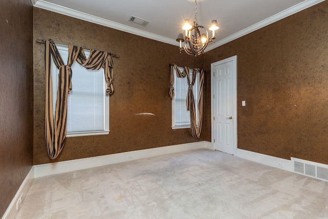 unfurnished room featuring carpet, ornamental molding, and a notable chandelier