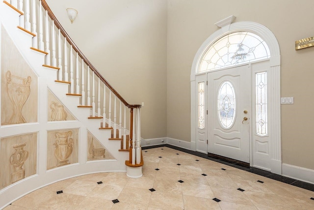 foyer entrance with tile patterned floors