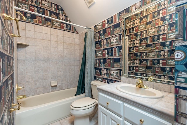 full bathroom with toilet, vanity, and shower / bath combo with shower curtain