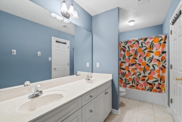 full bathroom featuring a textured ceiling, tile patterned flooring, vanity, toilet, and shower / tub combo with curtain