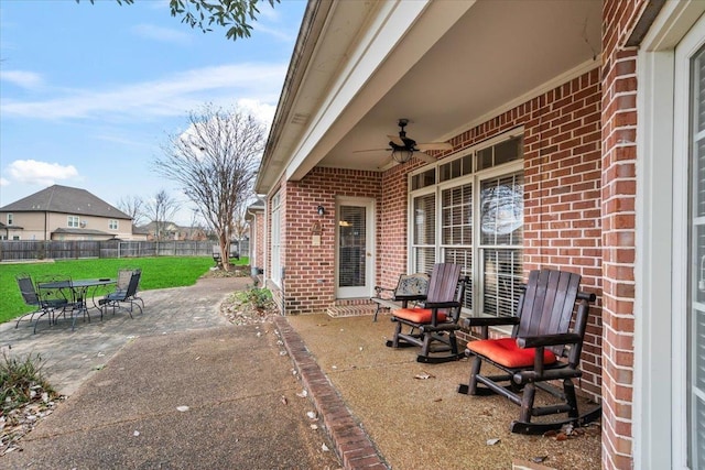 view of patio featuring ceiling fan