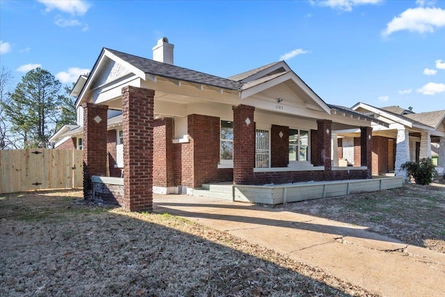 view of home's exterior with covered porch