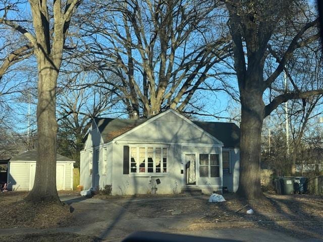 bungalow with a storage shed