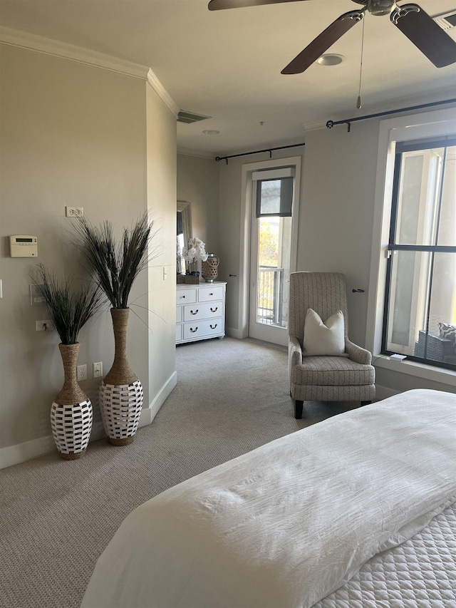 bedroom featuring light carpet, ceiling fan, ornamental molding, and access to exterior