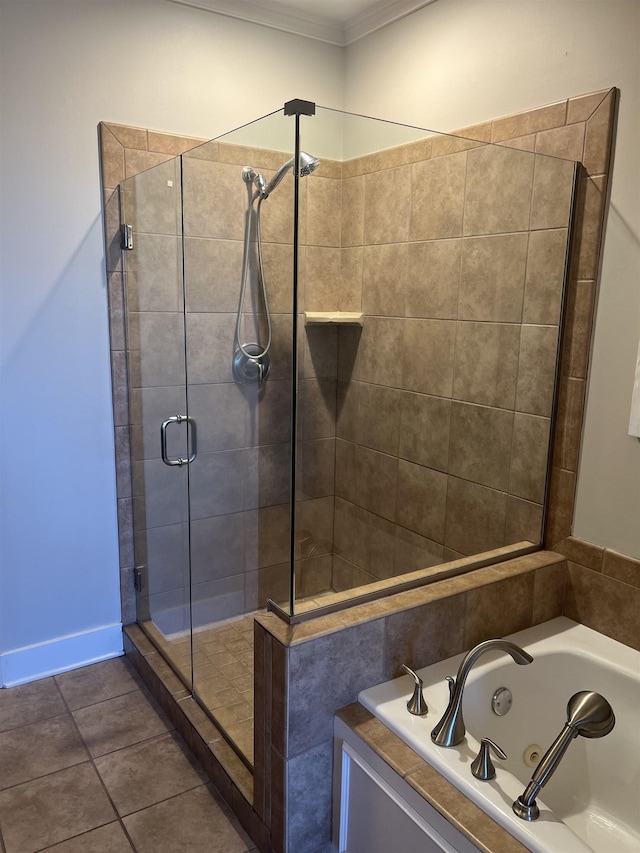 bathroom featuring ornamental molding, separate shower and tub, and tile patterned flooring