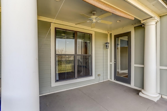 view of patio featuring ceiling fan