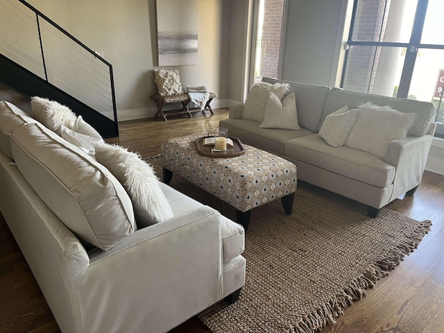 living room with dark hardwood / wood-style floors