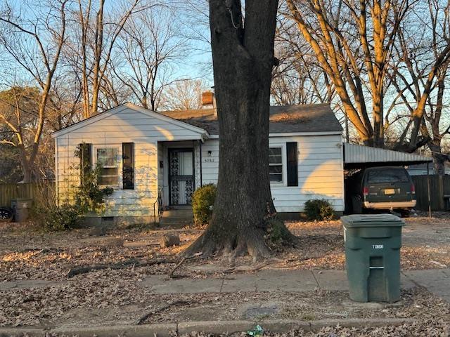 view of front of house with a carport