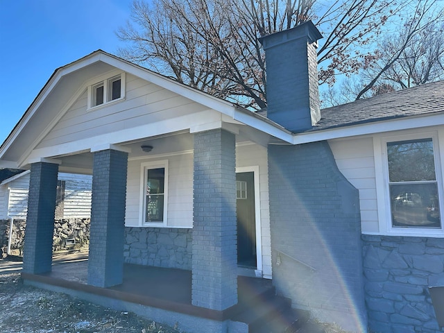 doorway to property featuring a porch