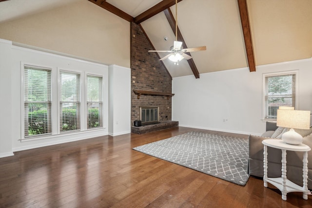 living room with high vaulted ceiling, wood-type flooring, a brick fireplace, and ceiling fan