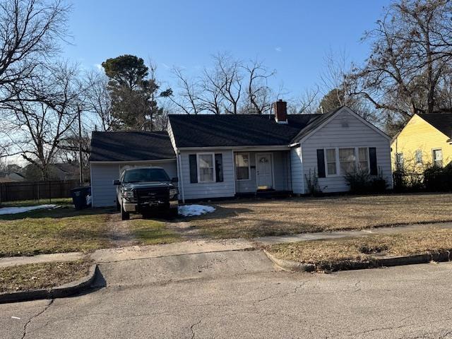 single story home with a garage