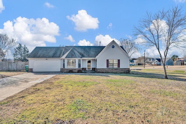 view of front facade featuring a garage and a front yard