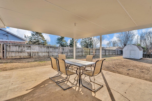 view of patio / terrace featuring a shed