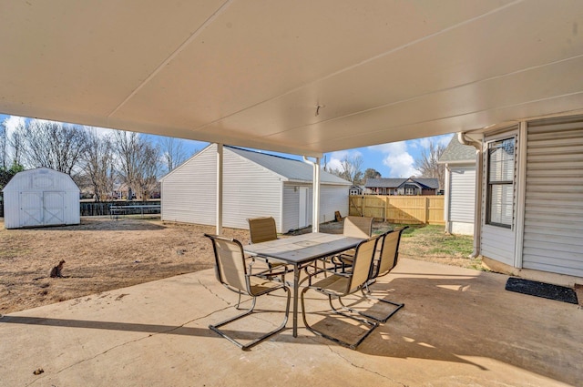 view of patio / terrace featuring a storage unit