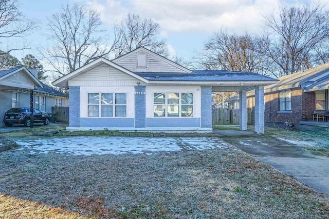 view of front facade featuring a carport