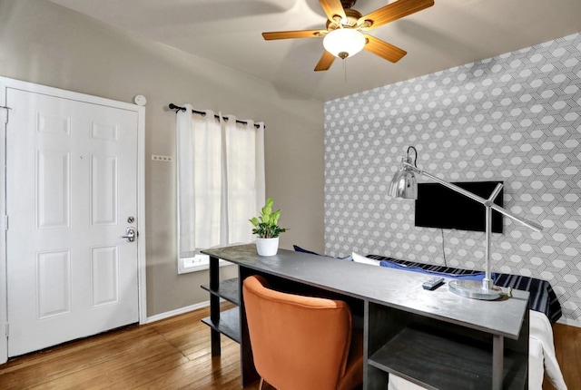 office space featuring ceiling fan and hardwood / wood-style floors