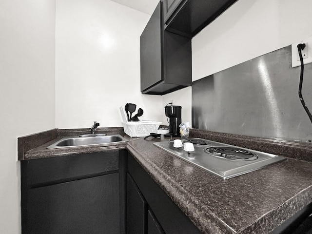 kitchen with stovetop and sink