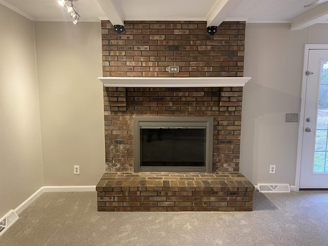 room details featuring carpet, beam ceiling, a fireplace, and ornamental molding