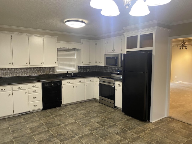 kitchen with black appliances, white cabinets, and ornamental molding