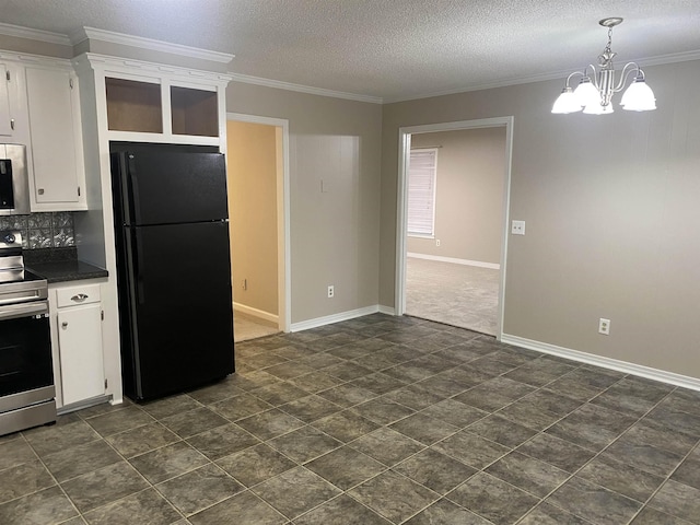 kitchen featuring stainless steel electric stove, white cabinetry, decorative backsplash, and black fridge