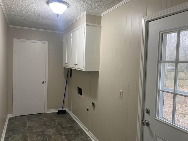 laundry area with washer hookup, cabinets, crown molding, and wooden walls