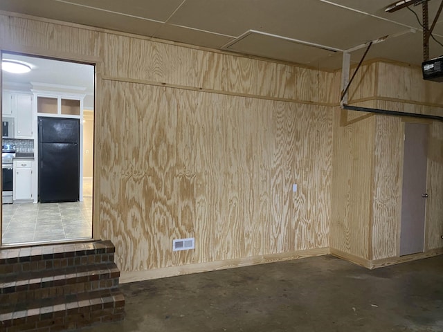 interior space featuring black fridge