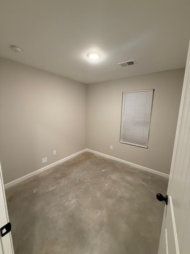 empty room featuring concrete floors