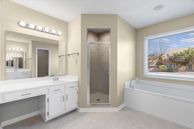 bathroom featuring separate shower and tub, vanity, and tile patterned floors