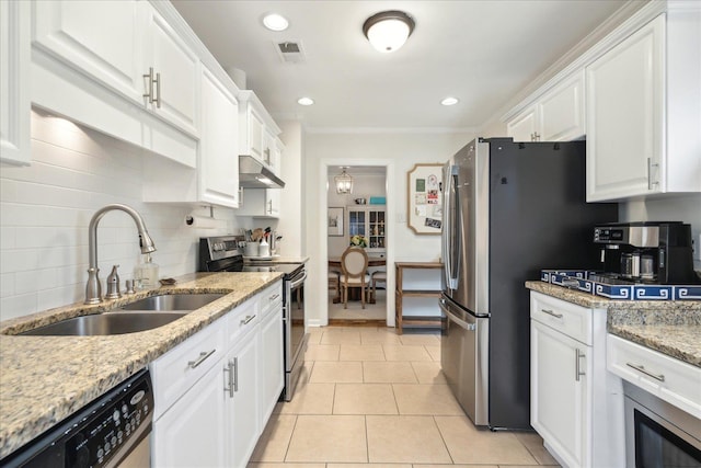 kitchen with sink, crown molding, light stone countertops, appliances with stainless steel finishes, and white cabinets